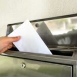 Prendere lettera dalla cassetta della posta