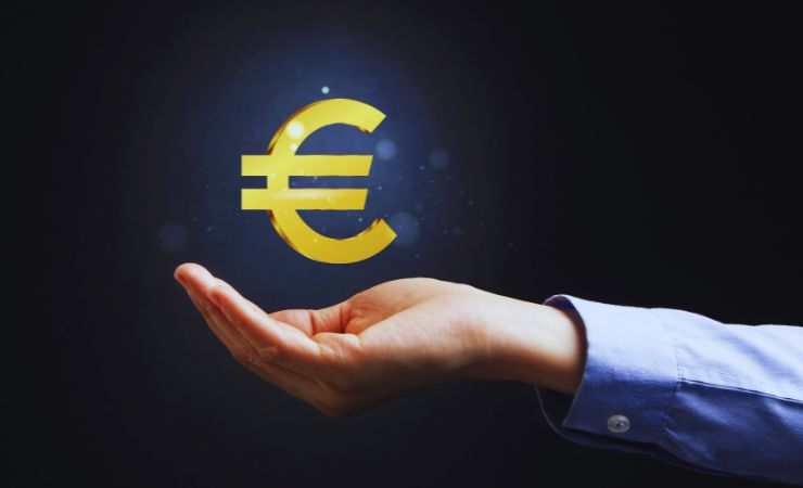 mano con simbolo euro